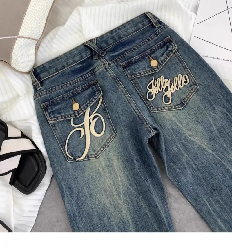 American retro low-waisted jeans female autumn new embroidery old casual fashion temperament slim Joker bell bottoms.